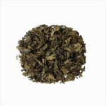 Dried nettle leaves in a textured pile, an organic product for natural health and a traditional wellness lifestyle.